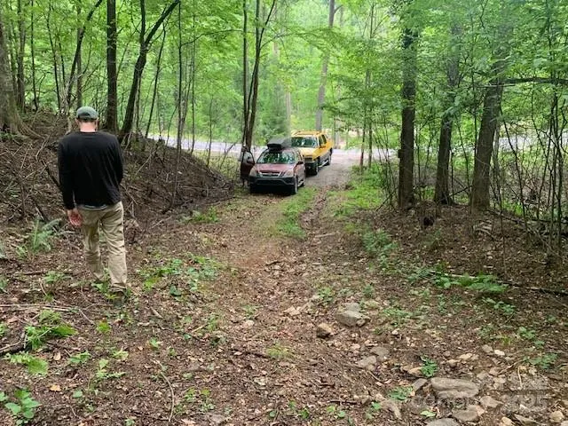 a view of a backyard with furniture