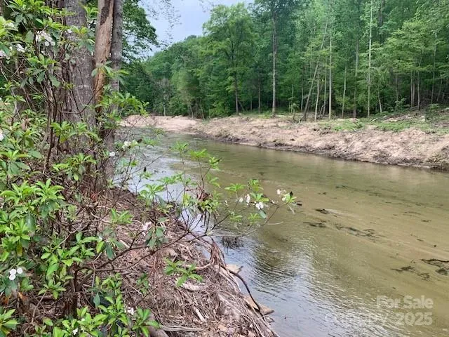 a view of a lake with beach