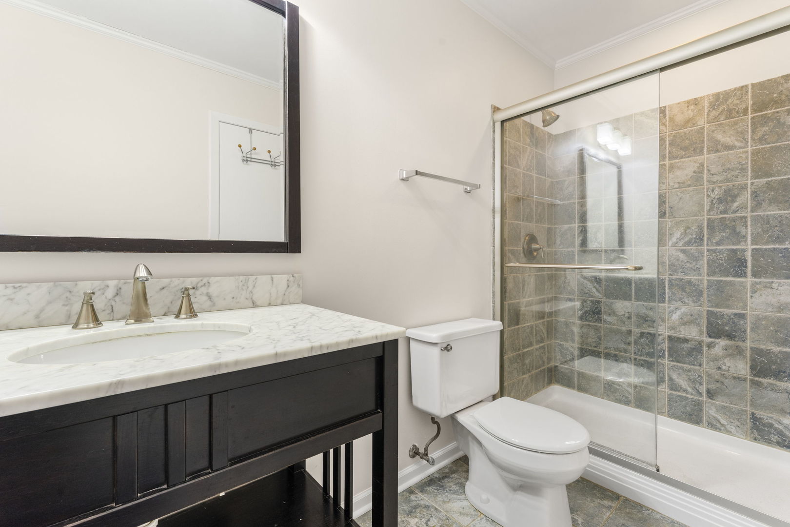 608 Carriage Hill Road Island Lake, IL 60042 - Photo 15 of 28 a bathroom with a granite countertop sink toilet a mirror and shower