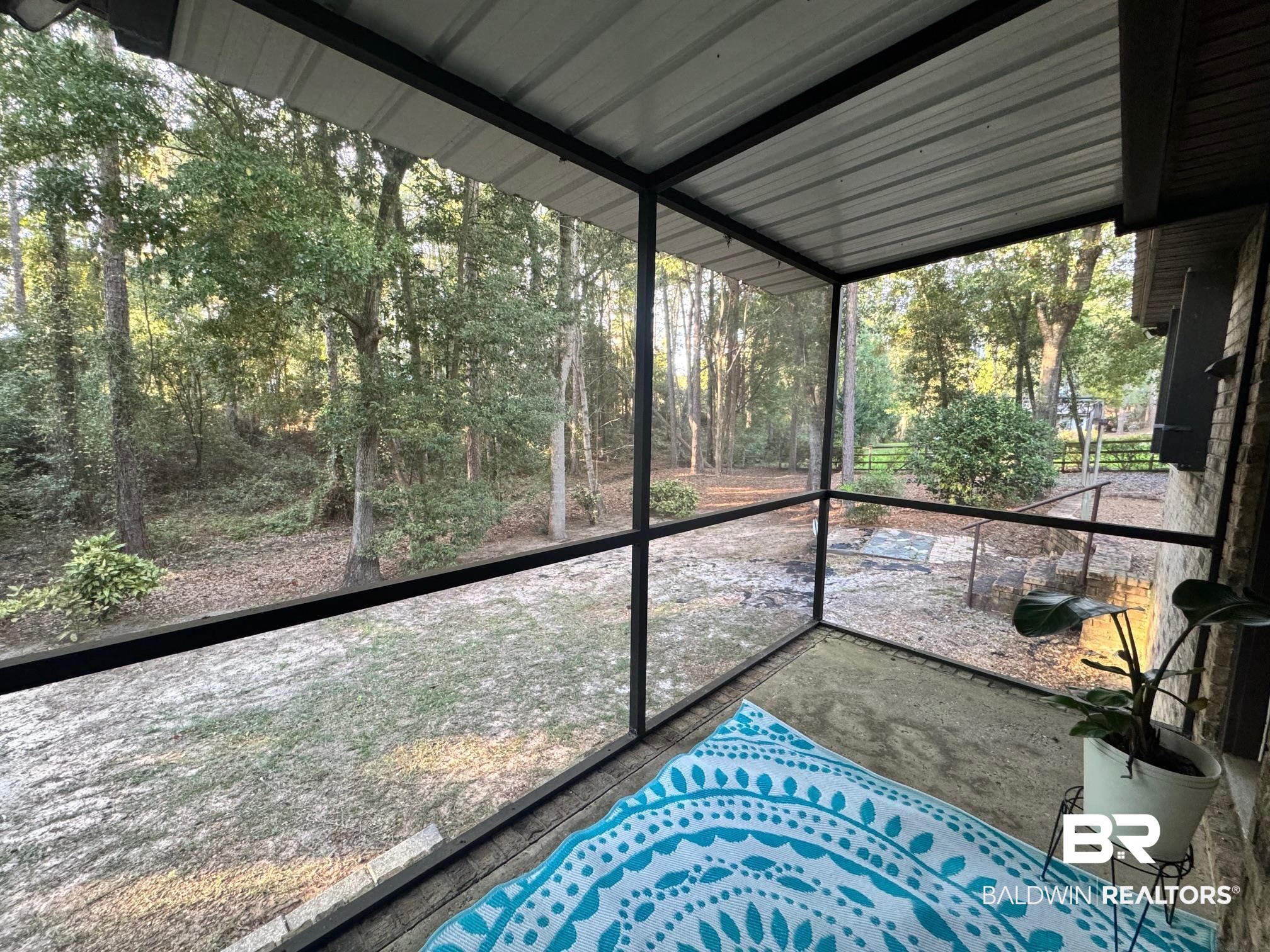 2682 Pine Ridge Drive Lillian, AL 36549 - Photo 14 of 37 View of unfurnished sunroom