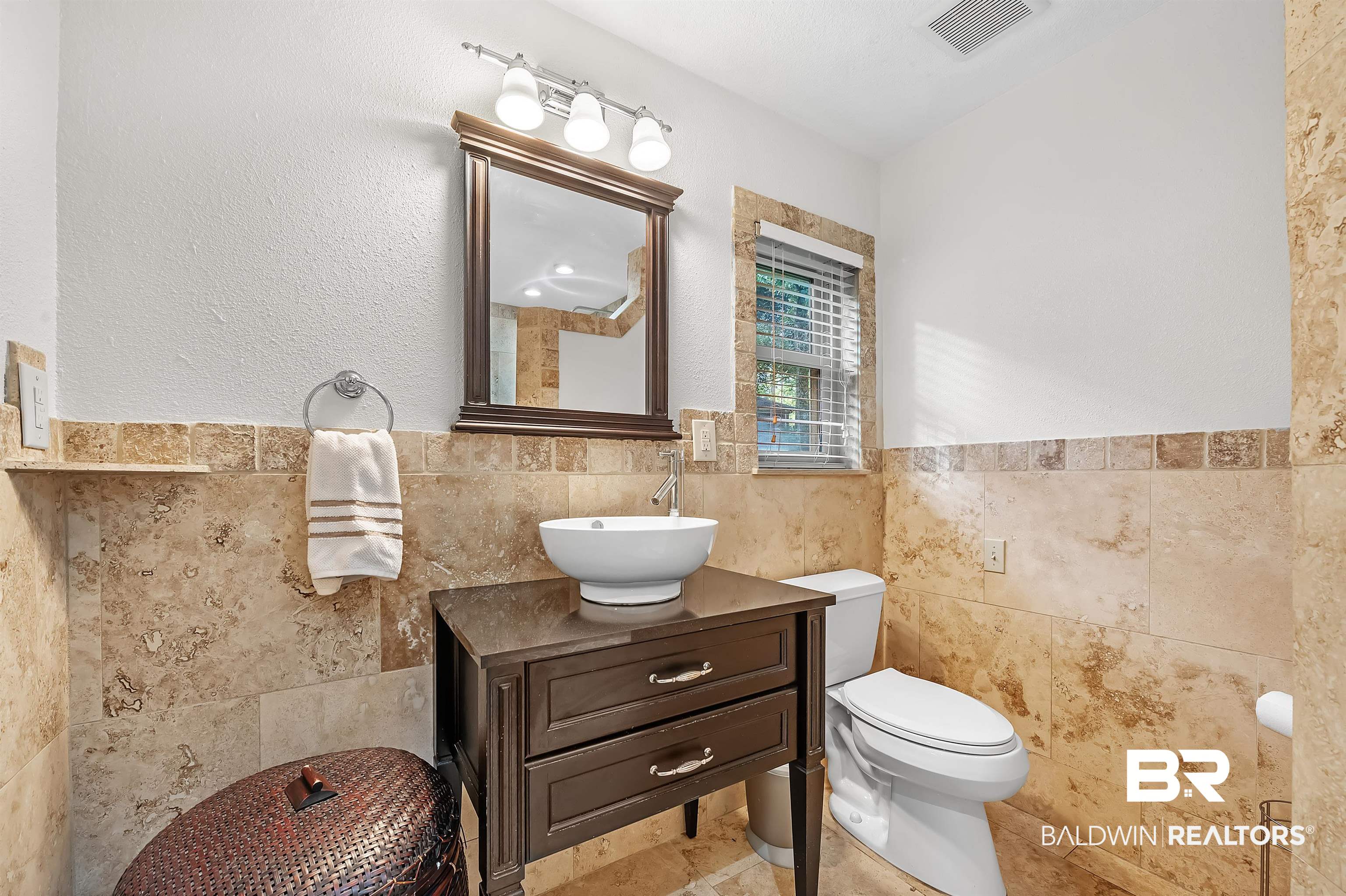 104 James Circle Daphne, AL 36526 - Photo 49 of 62 Bathroom with vanity, tile patterned flooring, toilet, and tile walls