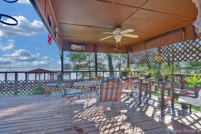 a view of a balcony with chairs