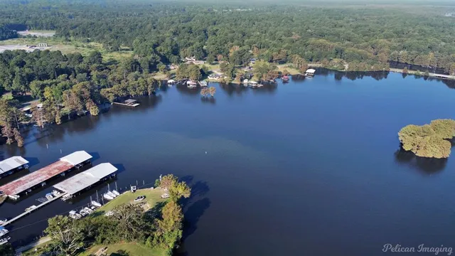 a view of swimming pool with sitting area