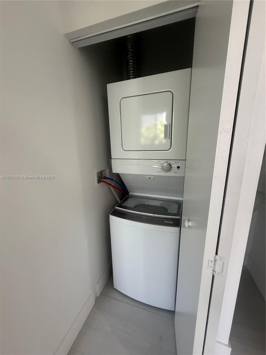 1091 East 17th Street, Unit 304 Hialeah, FL 33010 - Photo 18 of 25 a close view of a stove and microwave