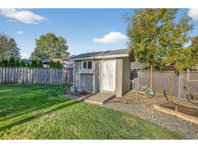 a house view with a backyard space