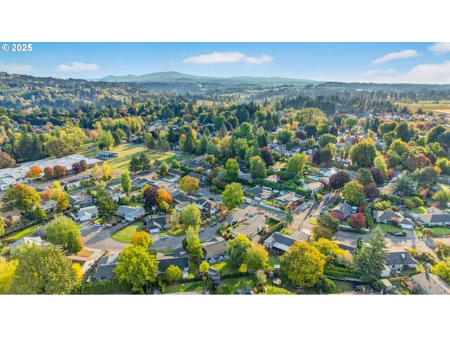 a picture of a bathroom with a shower