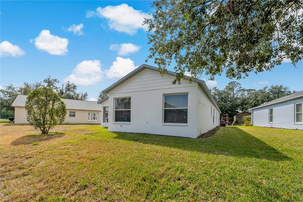 11744 Wheatfield Loop Hudson, FL 34667 - Photo 27 of 48 Back of Home