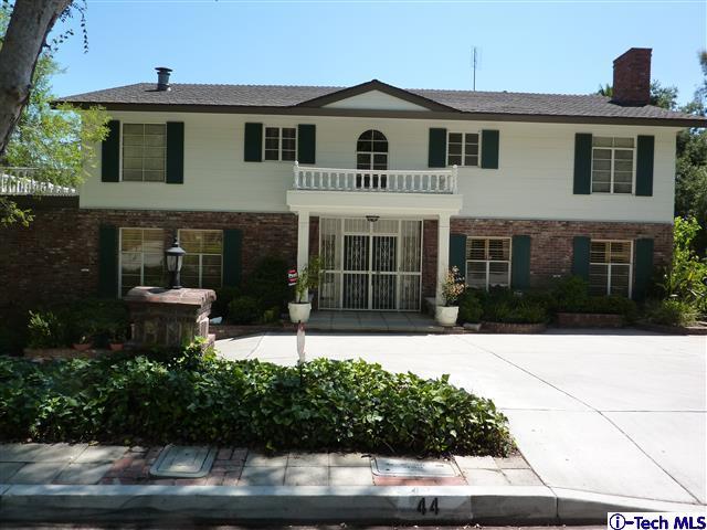 Undisclosed Address Pasadena, CA 91105 - Photo 3 of 50 a front view of a house with a yard