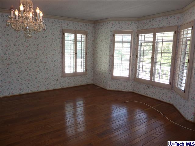 Undisclosed Address Pasadena, CA 91105 - Photo 24 of 50 a view of an empty room with wooden floor and a window