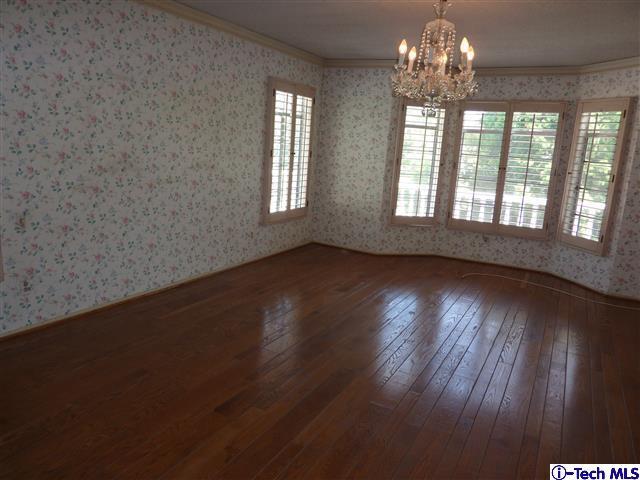 Undisclosed Address Pasadena, CA 91105 - Photo 25 of 50 a view of empty room with wooden floor and window