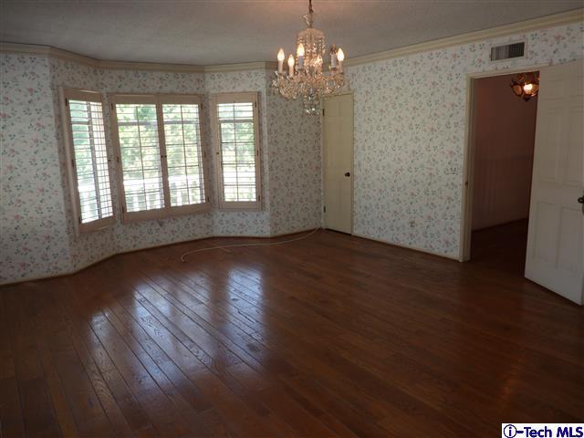 Undisclosed Address Pasadena, CA 91105 - Photo 26 of 50 a view of a livingroom with wooden floor and a large window
