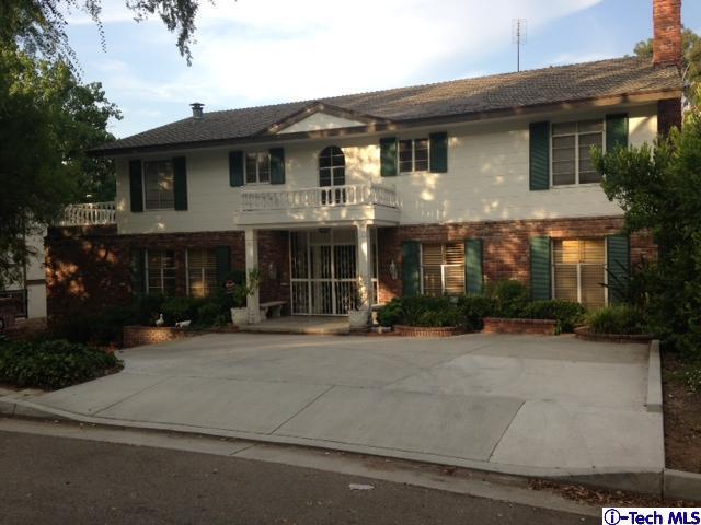 Undisclosed Address Pasadena, CA 91105 - Photo 4 of 50 a front view of a house with a porch