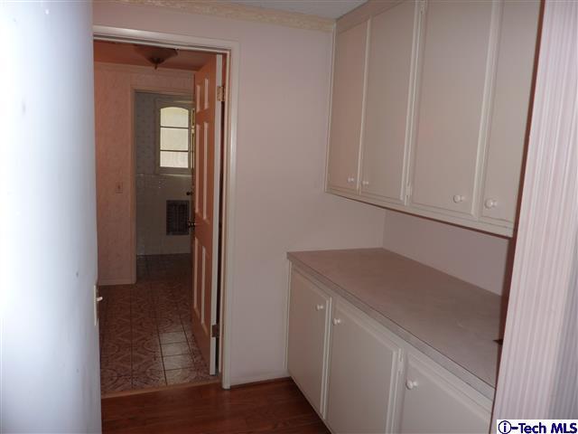 Undisclosed Address Pasadena, CA 91105 - Photo 31 of 50 a room with a sink and cabinets