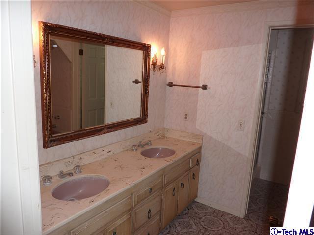 Undisclosed Address Pasadena, CA 91105 - Photo 32 of 50 a bathroom with a sink and a mirror
