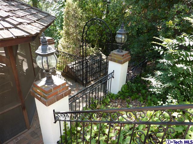 Undisclosed Address Pasadena, CA 91105 - Photo 41 of 50 a front view of a house with a yard