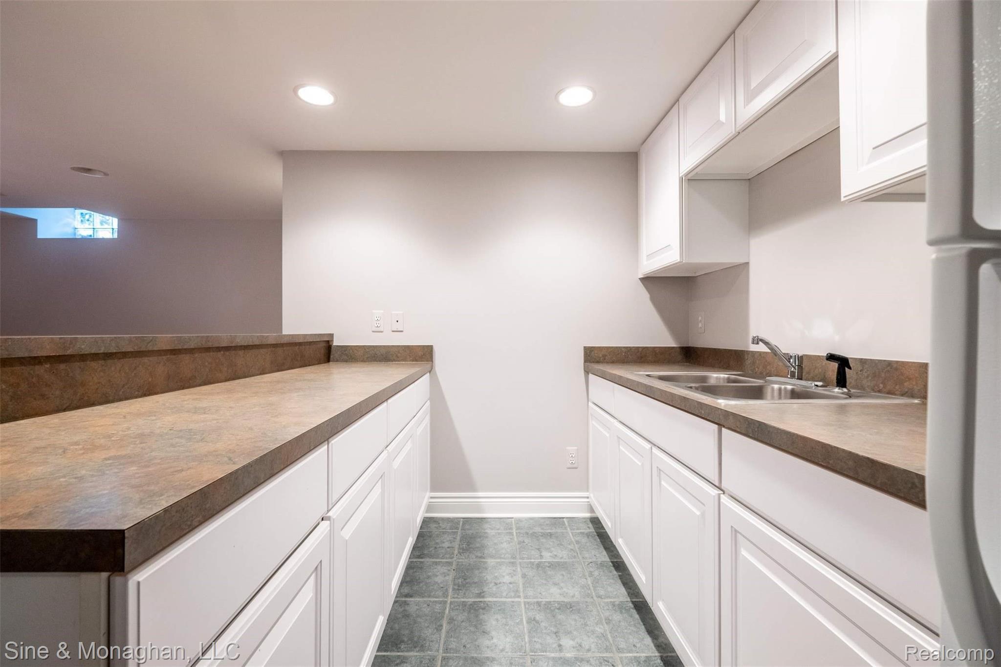 1388 Pebble Ridge Drive Rochester, MI 48307 - Photo 33 of 38 Lower Level Party Kitchen