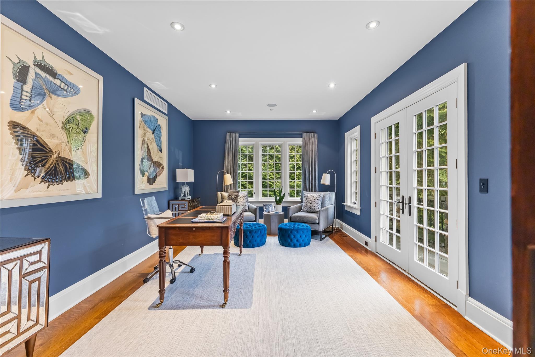 19 Park Drive South Rye, NY 10580 - Photo 11 of 42 a dining room with wooden floor and windows