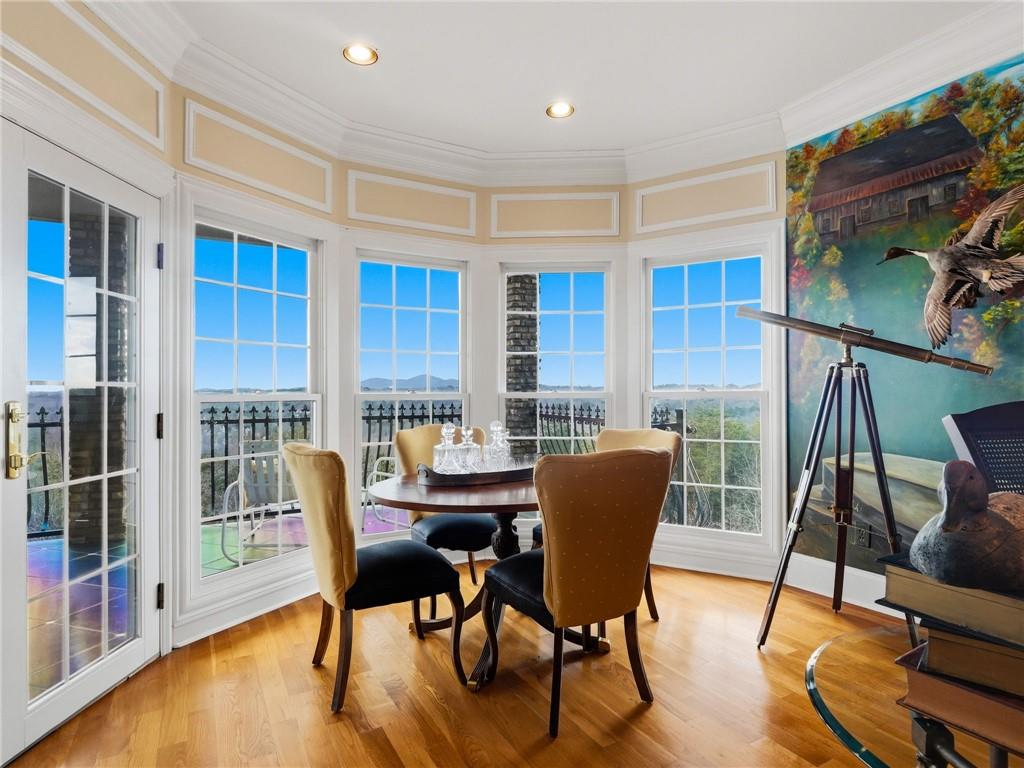 988 Hunters Ridge Jasper, GA 30143 - Photo 23 of 87 a dining room with furniture and wooden floor