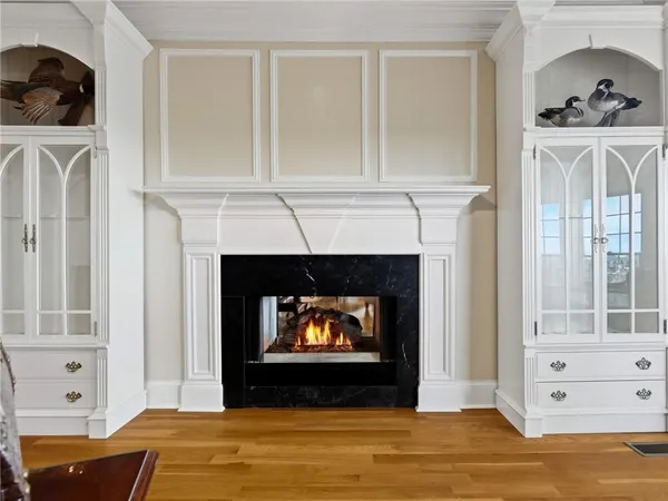 a bathroom with a tub and a view of bathroom