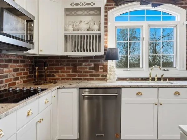 a very nice looking dining room with a table and chairs