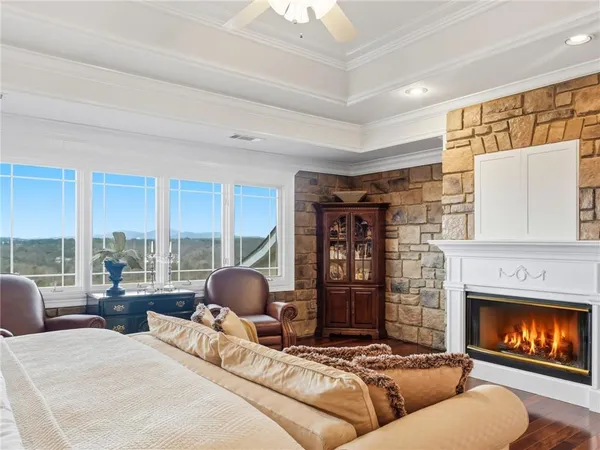 a front view of a fireplace with wooden floor