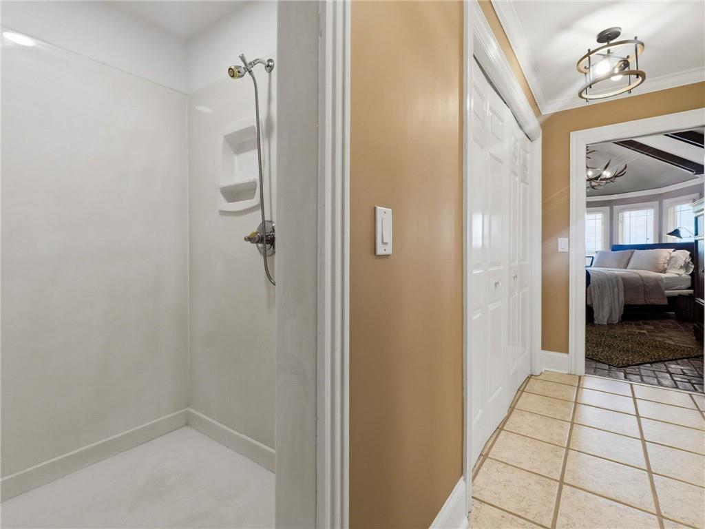 988 Hunters Ridge Jasper, GA 30143 - Photo 54 of 87 a bathroom with a shower and a sink