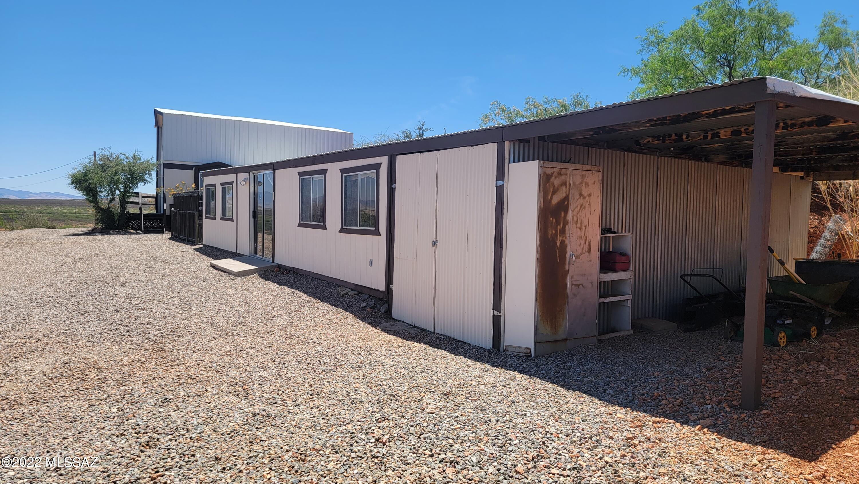 3399 Red Stag Road Pearce, AZ 85625 - Photo 45 of 47 a view of a house with a backyard