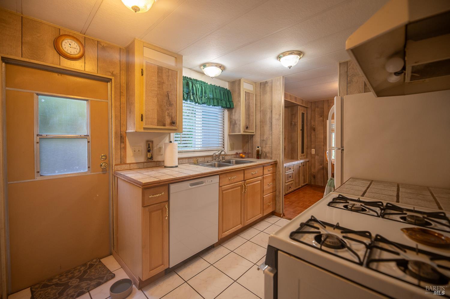 316 Círculo Durango Rohnert Park, CA 94928 - Photo 17 of 33 a kitchen with stainless steel appliances a stove a sink and a refrigerator