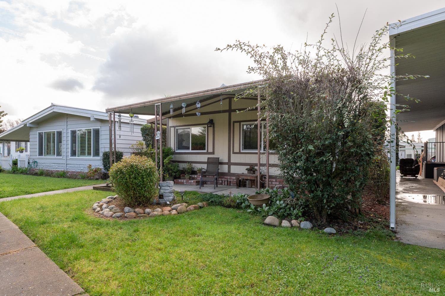 316 Círculo Durango Rohnert Park, CA 94928 - Photo 3 of 33 a front view of a house with a garden and yard