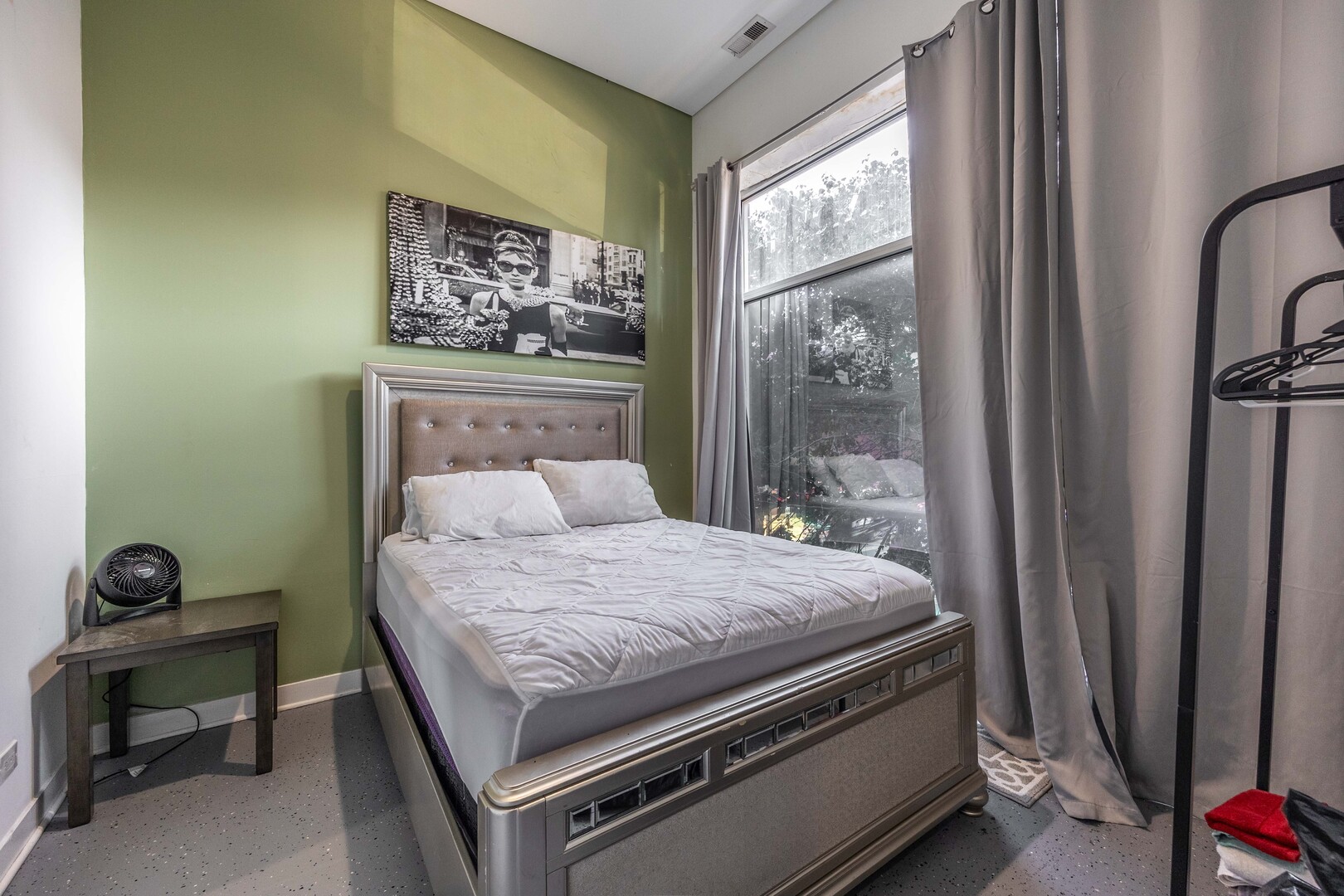 1002 West Lake Street, Unit 2 Chicago, IL 60607 - Photo 12 of 29 a bedroom with a bed and a window