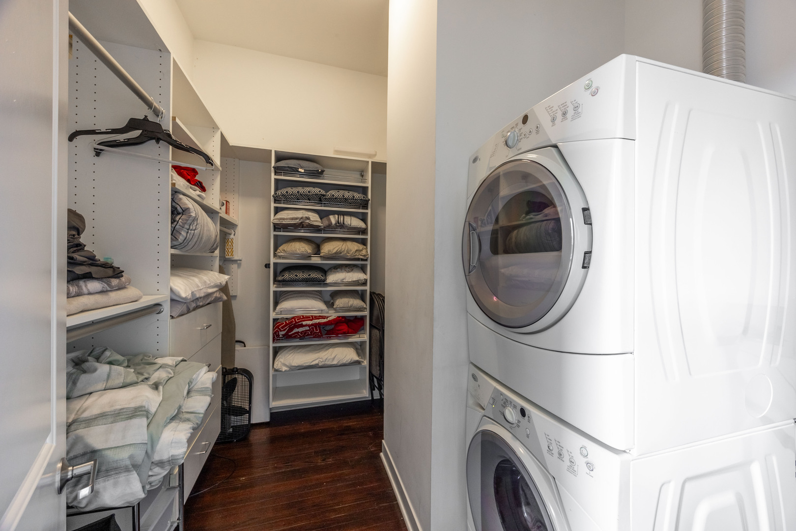 1002 West Lake Street, Unit 2 Chicago, IL 60607 - Photo 19 of 29 a view of walk in closet with clothes and shoes