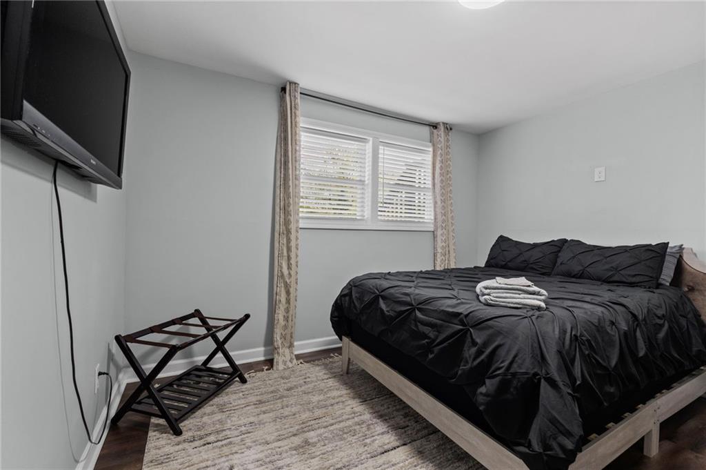 1467 Timms Circle Southeast Atlanta, GA 30316 - Photo 14 of 19 a bedroom with a bed and a tv