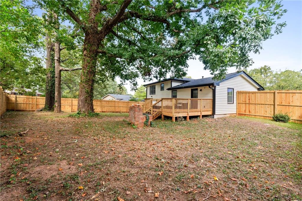 1467 Timms Circle Southeast Atlanta, GA 30316 - Photo 19 of 19 a white house that has a tree in front of it