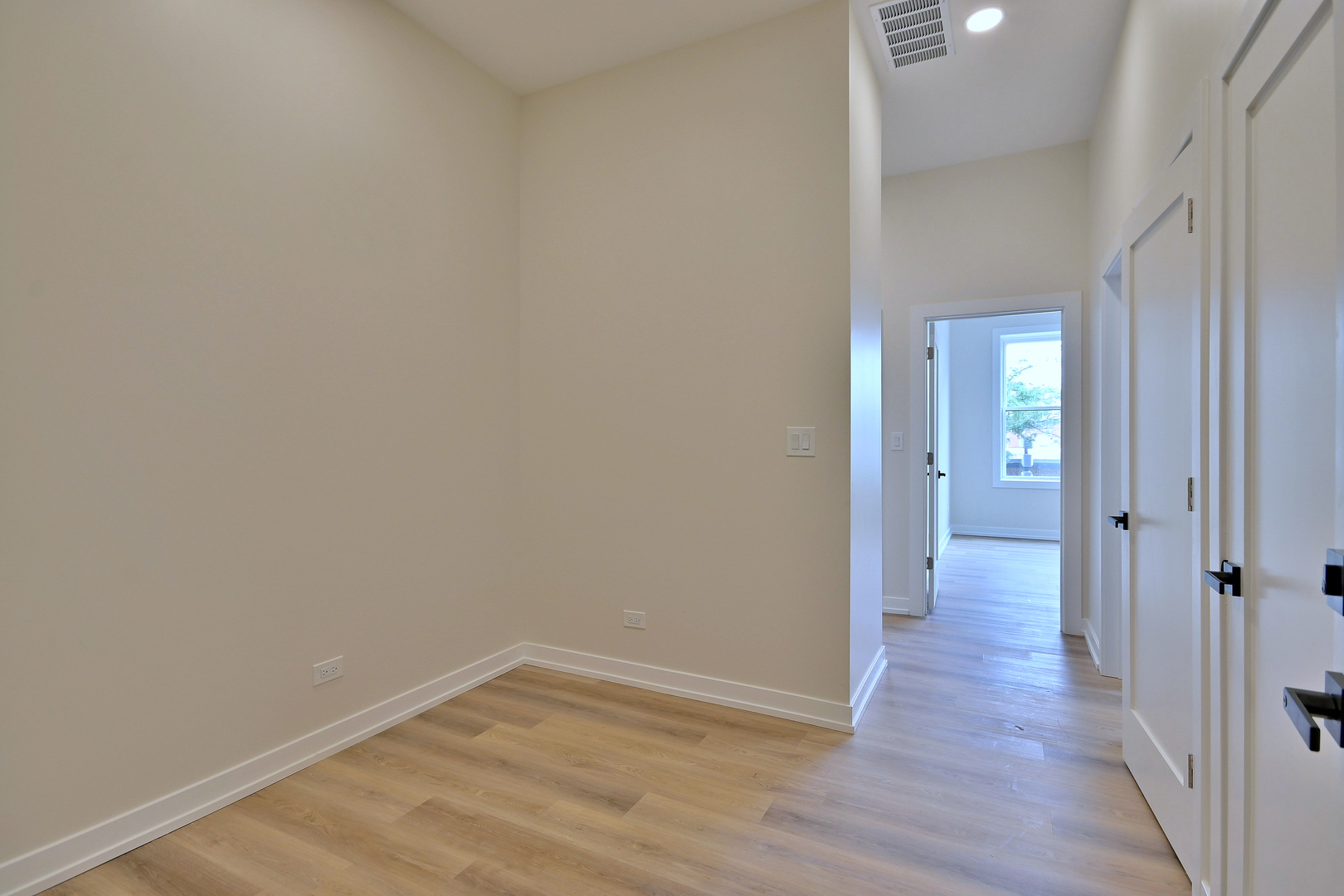 7518 Madison Street, Unit E Forest Park, IL 60130 - Photo 26 of 30 a view of a room with wooden floor
