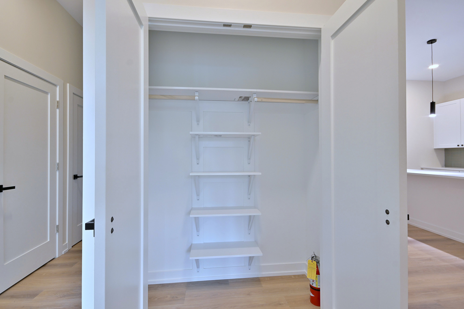 7518 Madison Street, Unit E Forest Park, IL 60130 - Photo 29 of 30 a view of walk in closet with empty racks