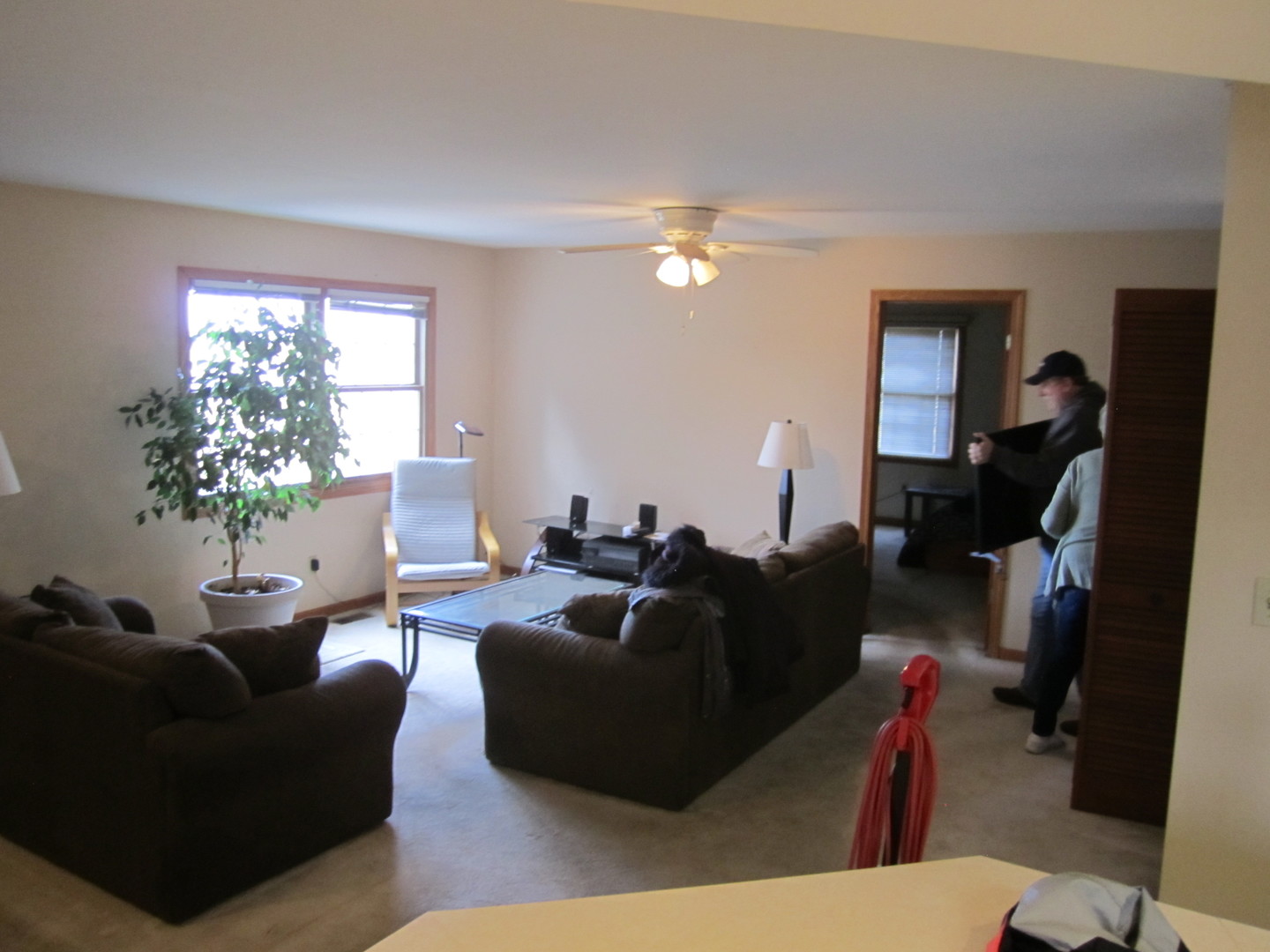 400 South Peace Road, Unit 1 Sycamore, IL 60178 - Photo 3 of 12 a living room with furniture flowerpot and a window