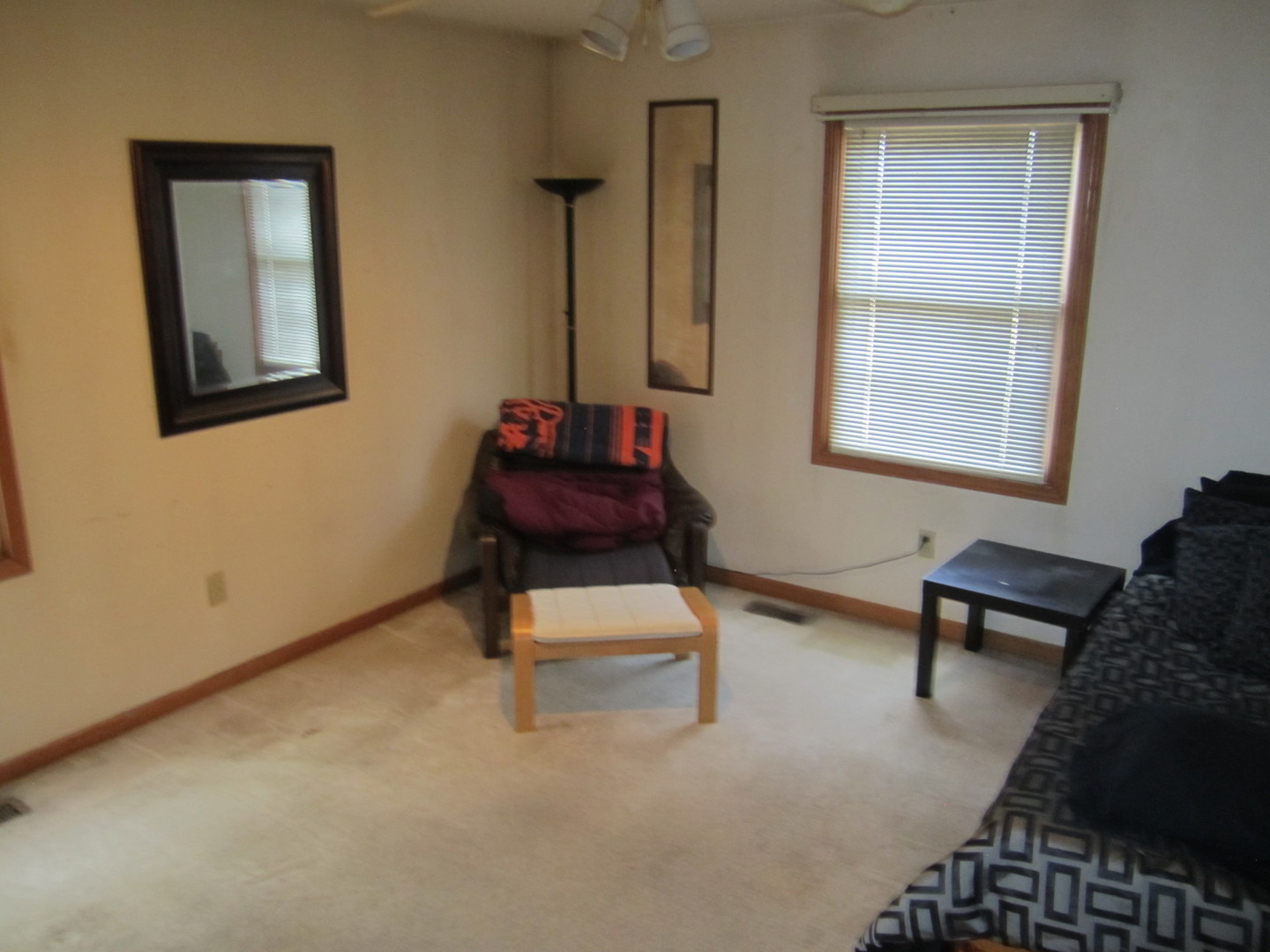 400 South Peace Road, Unit 1 Sycamore, IL 60178 - Photo 9 of 12 a living room with furniture and a window