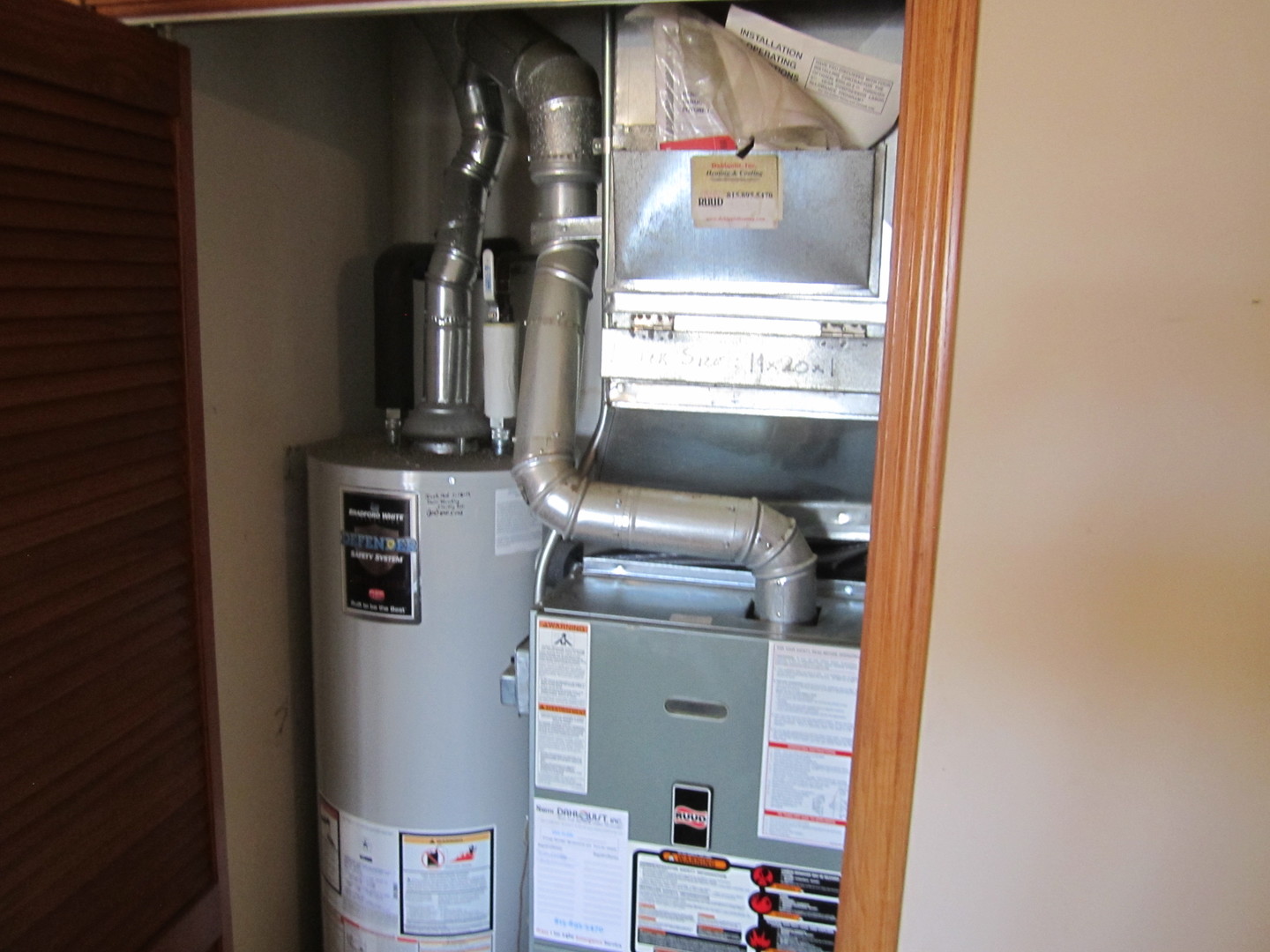 400 South Peace Road, Unit 1 Sycamore, IL 60178 - Photo 10 of 12 a close view of water heater room