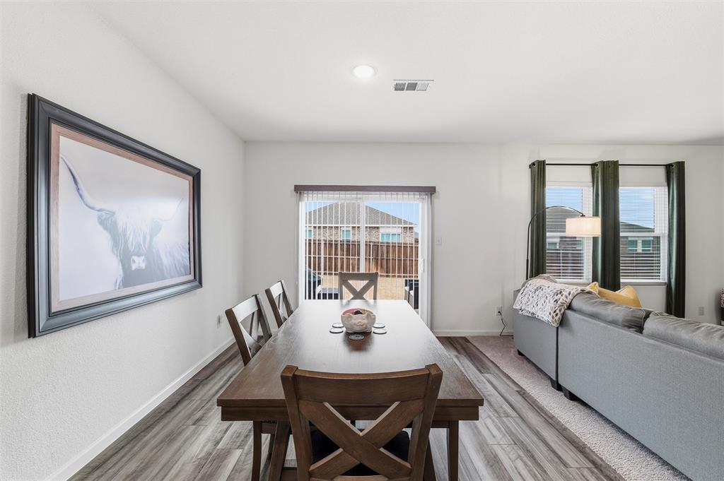 2616 Beech Crk Road Glenn Heights, TX 75154 - Photo 17 of 40 a dining room with furniture and window