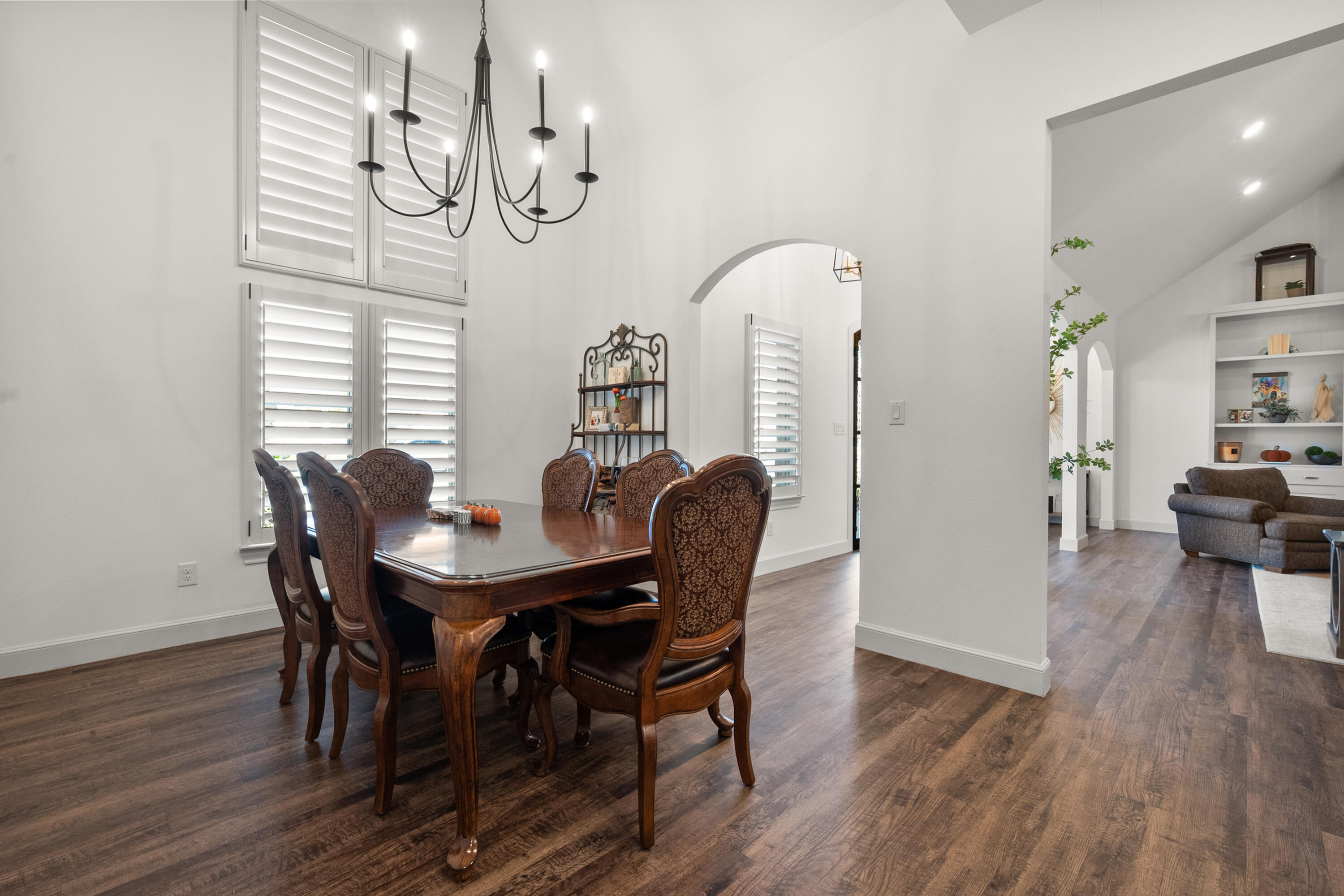 4509 140th Street Lubbock, TX 79424 - Photo 17 of 41 a view of a dining room with furniture window and wooden floor