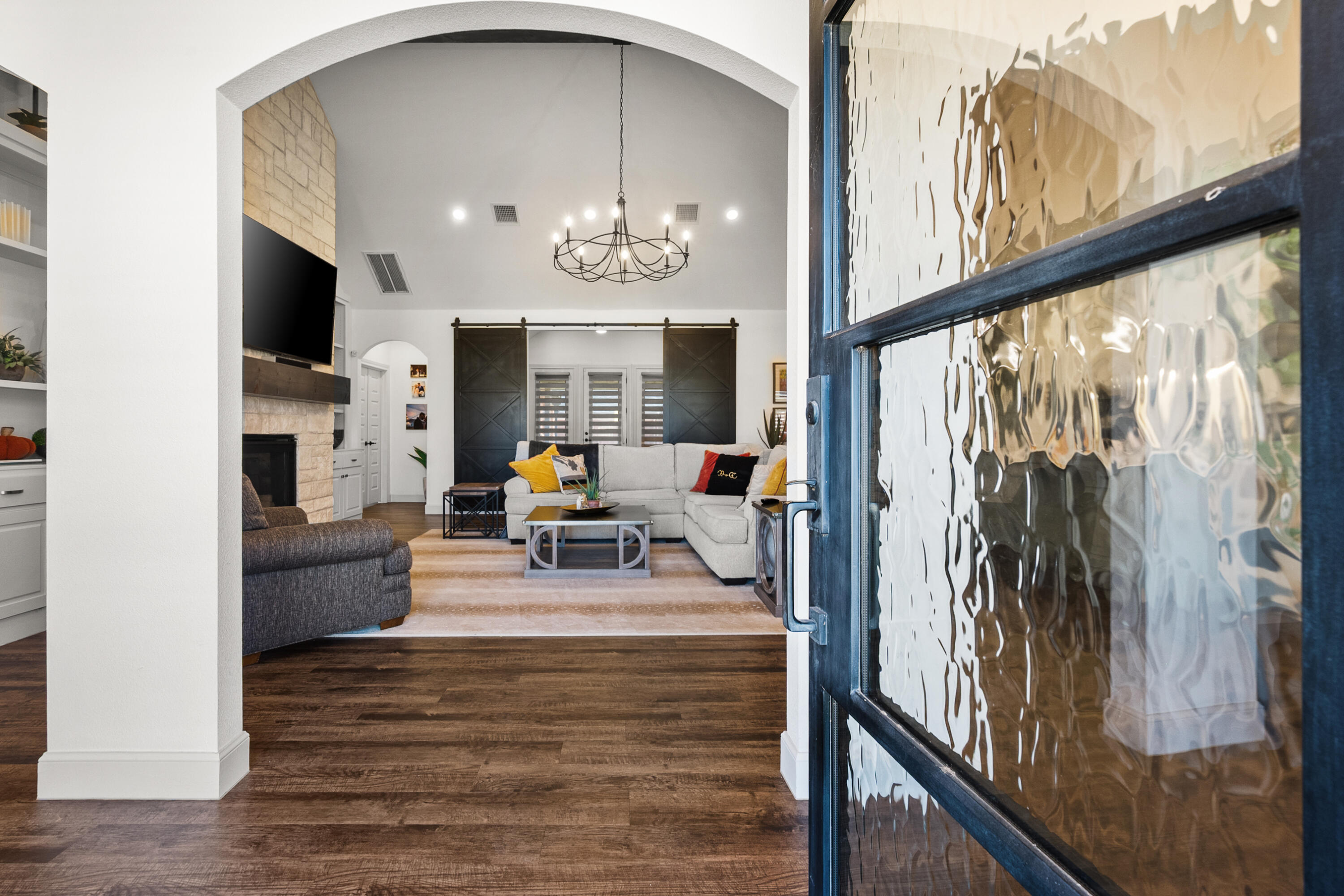 4509 140th Street Lubbock, TX 79424 - Photo 3 of 41 a view of a livingroom with furniture a flat screen tv and outdoor view