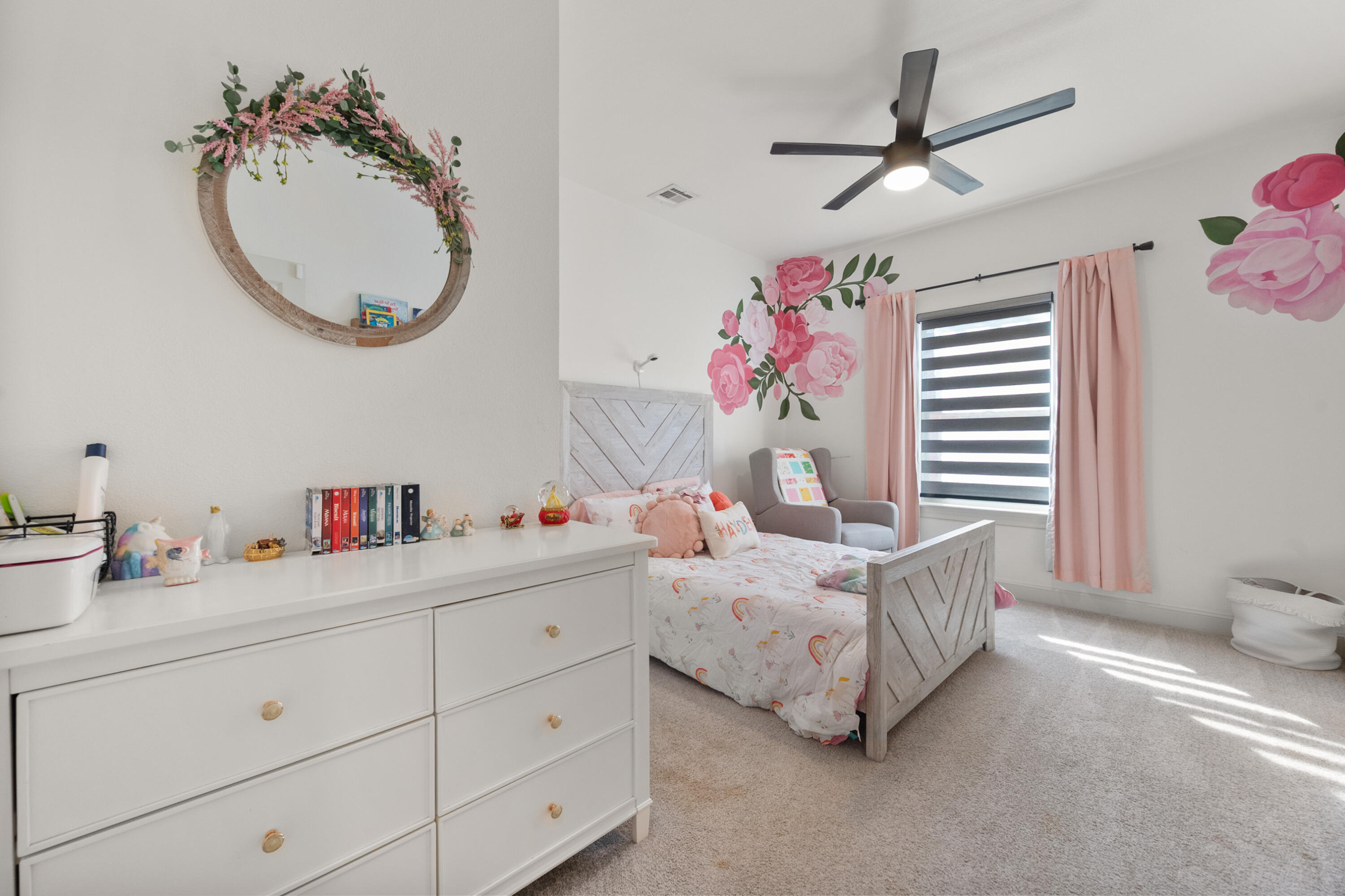 4509 140th Street Lubbock, TX 79424 - Photo 31 of 41 a living room with furniture and a chandelier
