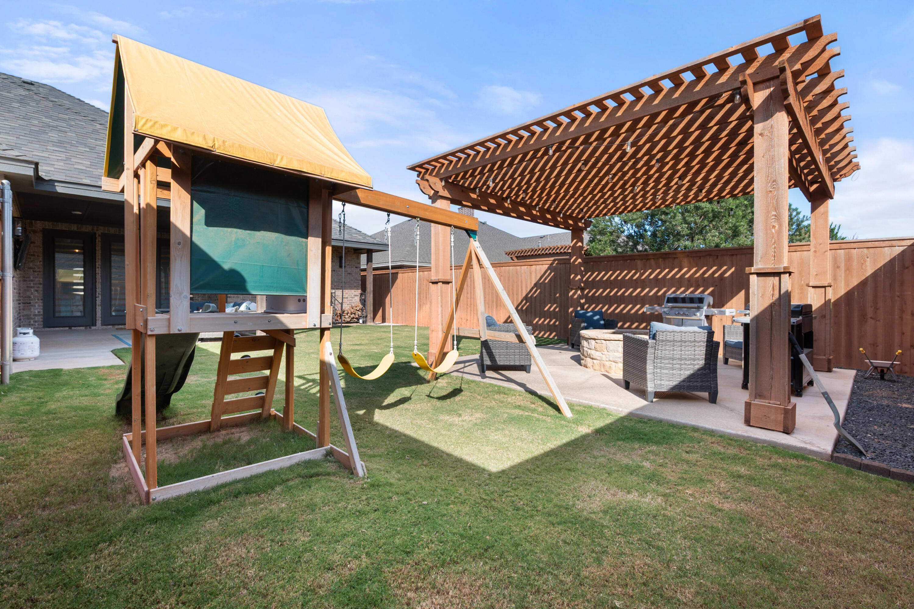 4509 140th Street Lubbock, TX 79424 - Photo 41 of 41 a view of a house with backyard and porch