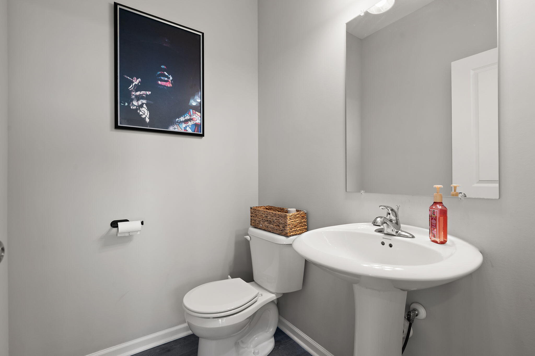 11897 Rhode Island Street Crown Point, IN 46307 - Photo 12 of 21 a bathroom with a sink toilet and a mirror