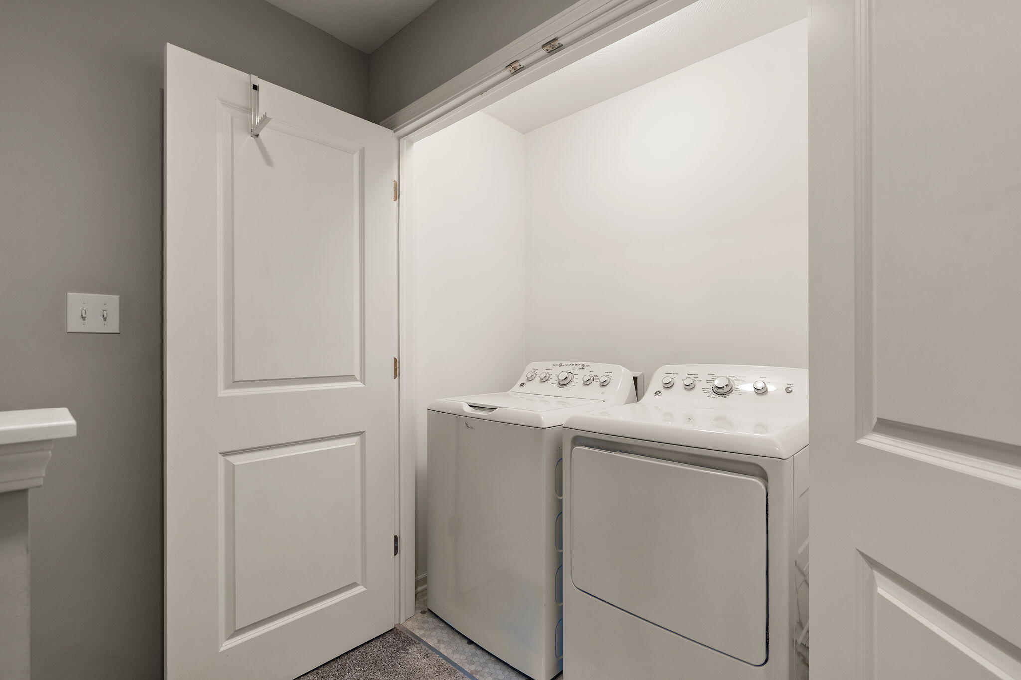 11897 Rhode Island Street Crown Point, IN 46307 - Photo 16 of 21 a utility room with dryer and washer