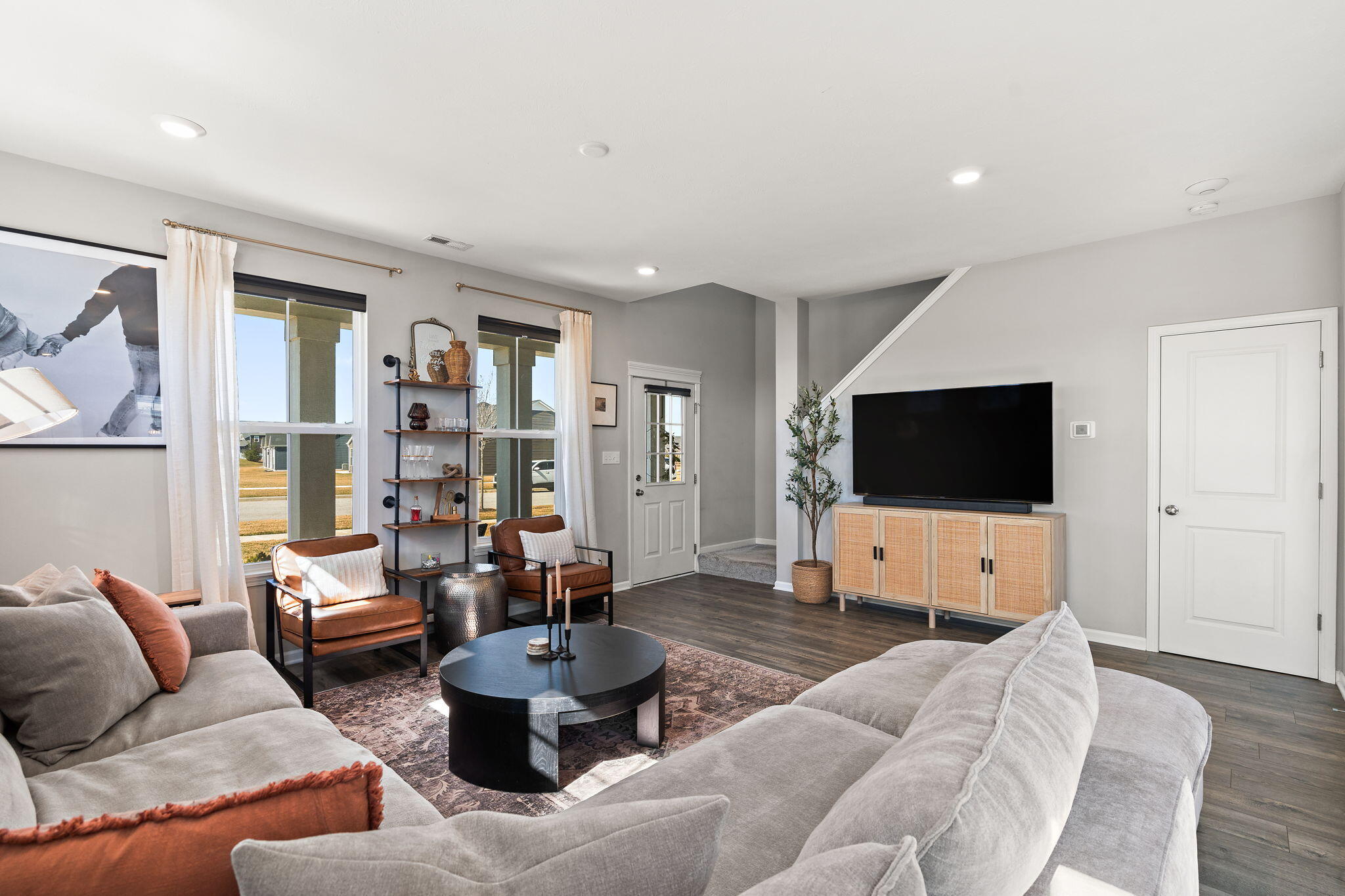 11897 Rhode Island Street Crown Point, IN 46307 - Photo 6 of 21 a living room with furniture and a flat screen tv