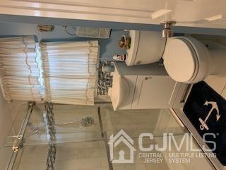 707 Spruce Road North Brunswick, NJ 08902 - Photo 12 of 23 a picture of a bathroom