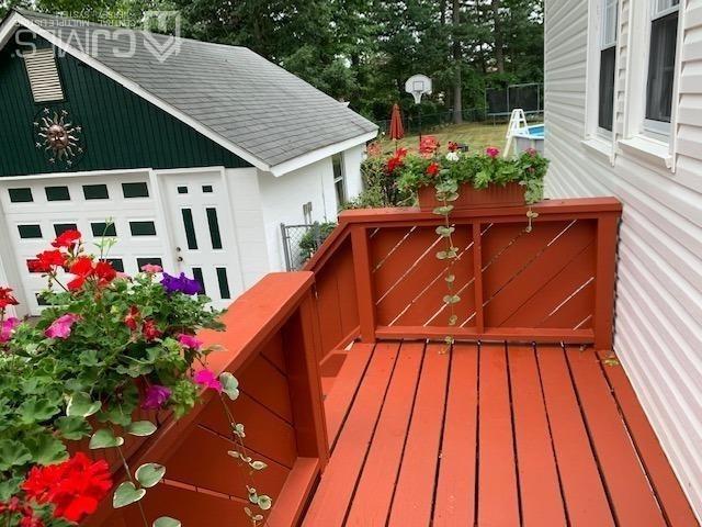 707 Spruce Road North Brunswick, NJ 08902 - Photo 17 of 23 a view of outdoor space deck and kitchen