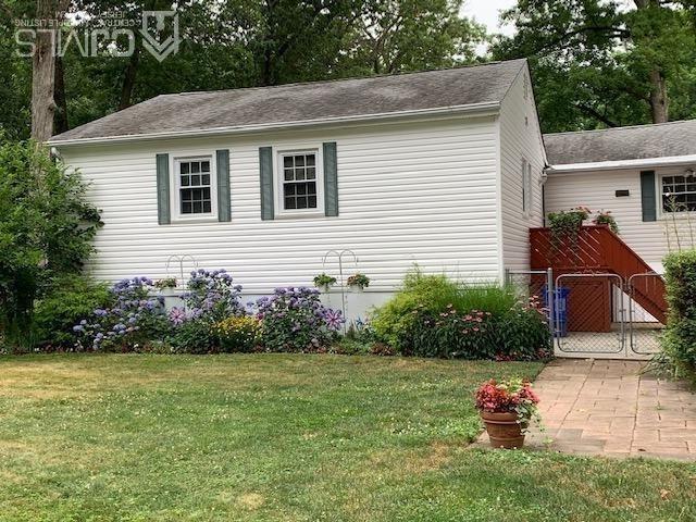 707 Spruce Road North Brunswick, NJ 08902 - Photo 21 of 23 a backyard of a house with potted plants