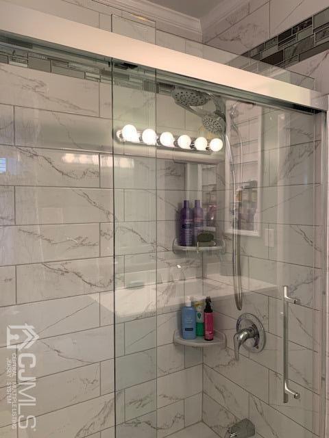 707 Spruce Road North Brunswick, NJ 08902 - Photo 10 of 23 a bathroom with a shower